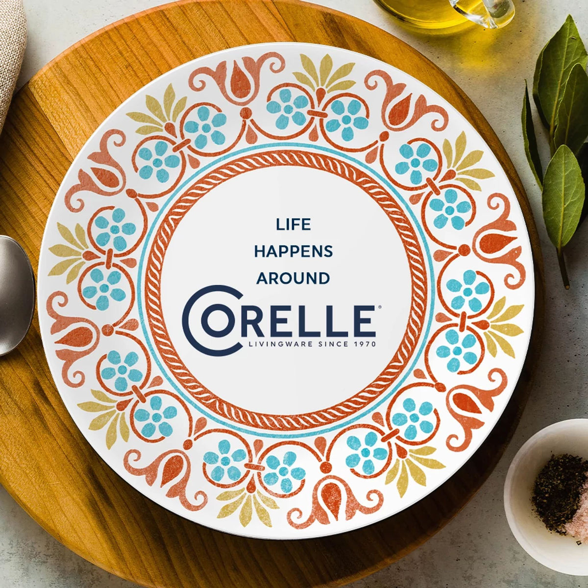 Terracotta Dreams dinnerplate with text that says life happens around Corelle