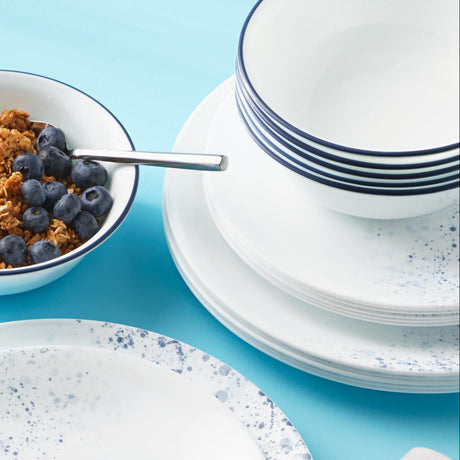  Indigo Speckle dinner, salad plate &amp; cereal bowls on table