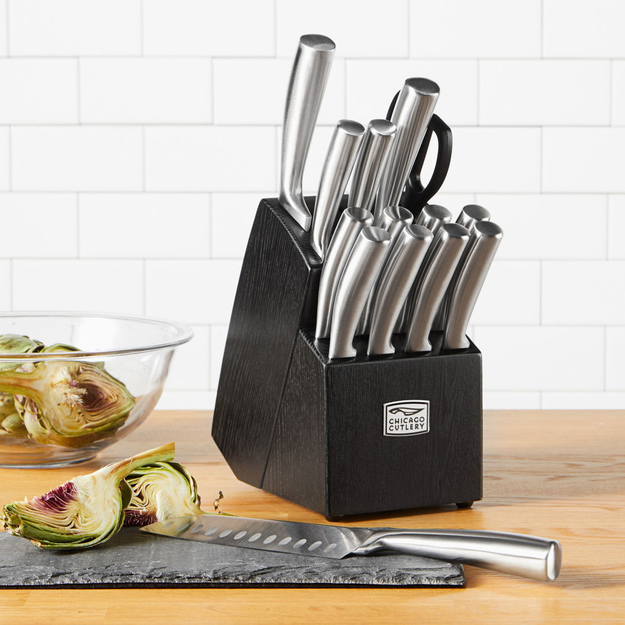  Malden™ 16-piece Stainless Steel Block Set on counter with artichoke on counter