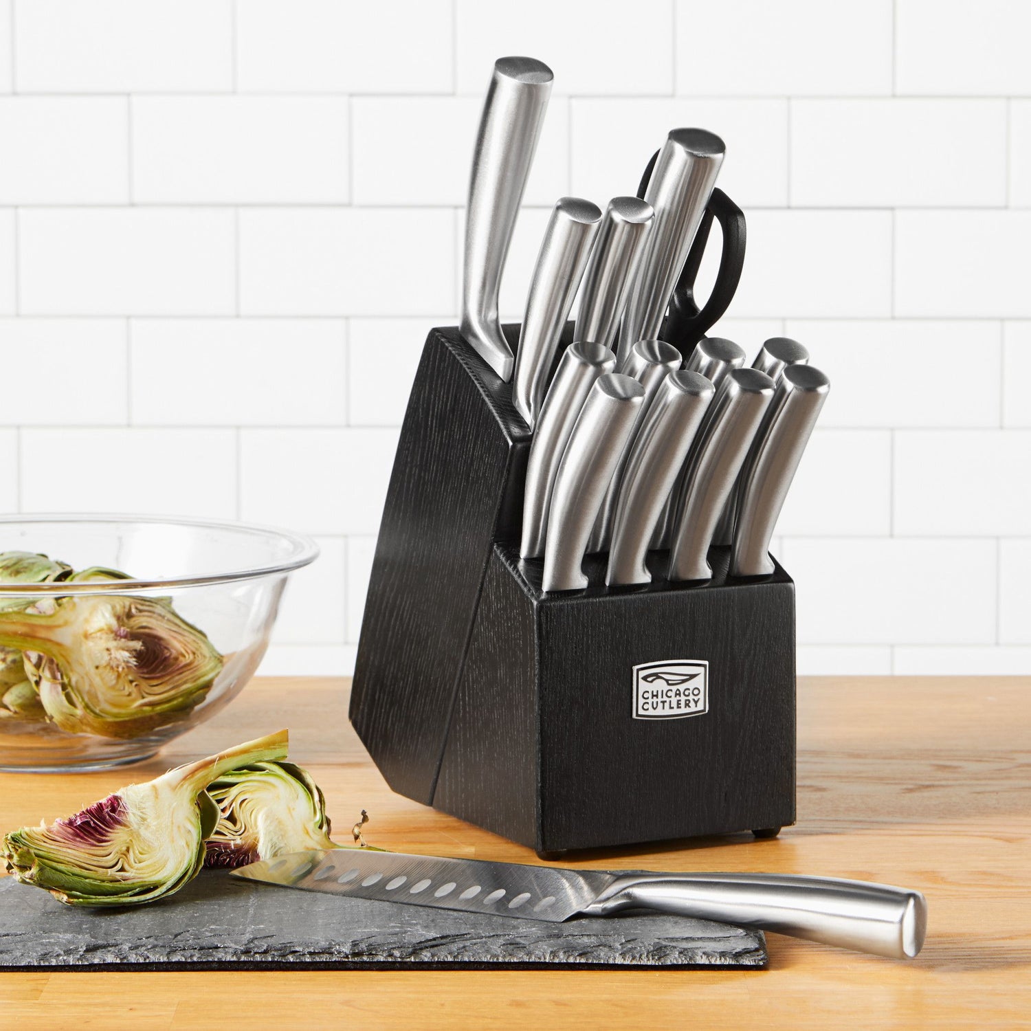  Malden™ 16-piece Stainless Steel Block Set on counter with artichoke on counter