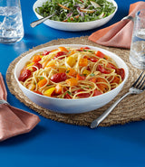  Meal bowl on table with pasta with tomatoes 